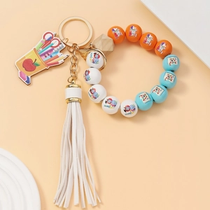 Teacher theme beaded keychain with apple patterns, colorful tassels and pencil holder charm