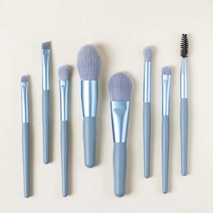 Detailed view of 8-piece mini makeup brush set in Morandi blue with soft synthetic bristles