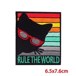 Embroidered black cat patch with sunglasses and Rule The World text for jackets