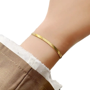 Chic double-layered titanium steel snake chain bracelet in polished gold finish for women