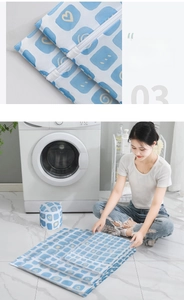 Mesh laundry bag set with blue heart pattern and protective zipper cover feature