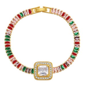 Vintage gold bracelet featuring colorful square zircons and a central crystal diamond