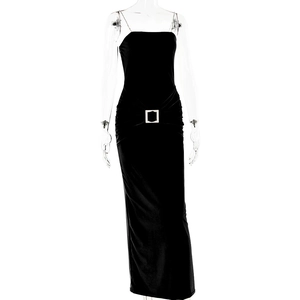 Detail of elegant black dress showing a sparkling silver square buckle at the high waist
