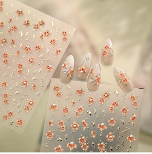 Detailed 3D floral nail art stickers with pearls and golden embossed leaf patterns