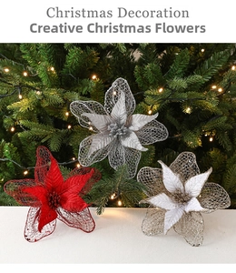 Detail of red and gold glitter mesh Christmas flowers with layered petals and beads