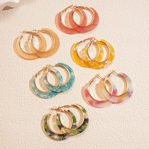 Chic C-shaped acetate earrings set with leopard and marble patterns in colorful tones