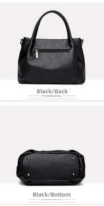 Detail view of black litchi texture leather tote bag featuring back zipper and metal studs