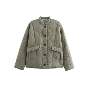 Vintage quilted jacket in olive green featuring wave patterns and leopard print lining