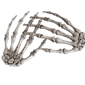 Realistic Halloween skeleton hand props with antique bone finish for spooky decorations