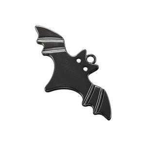 Close-up of a black metal bat pendant with top loop for jewelry and DIY crafting