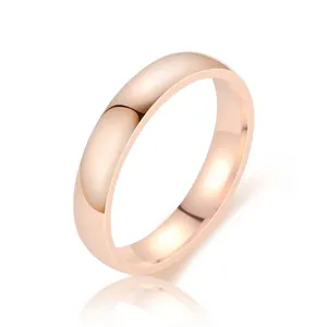 Polished rose gold stainless steel 4mm domed ring for couples shown on a white background