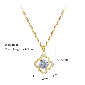 Detailed view of hollow four-leaf clover necklace dimensions and sparkling crystals