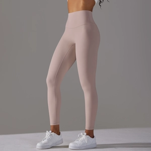 Close-up of high-waisted seamless waistband on dusty rose yoga pants for women