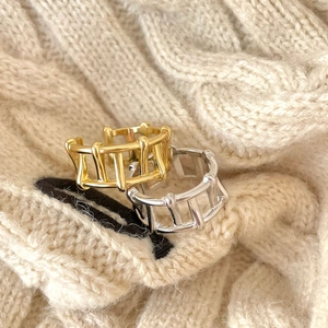 Detailed view of hollow minimalist 925 sterling silver rings in gold and silver finish