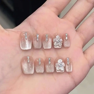 Pink cat eye gradient press-on nails with 3D floral relief and rhinestones, 10-piece set