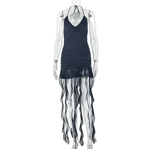Detail of ruffled halter neck and asymmetrical sheer mesh hem on a black bodycon dress