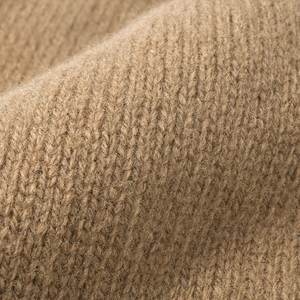 Unisex striped wool knit beanie featuring premium camel ribbed texture and warm ear protection