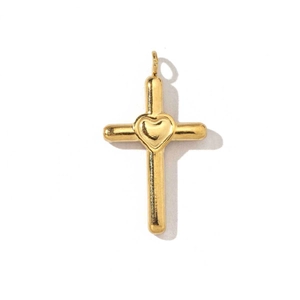 Makroaufnahme von goldenem Kreuzanhänger mit Herzdetail aus poliertem Edelstahl