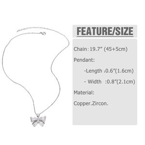 Detail view of silver bow necklace with zircon inlays and dimensions specifications
