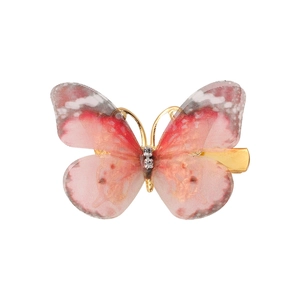 Detail eines rosa und roten Schmetterling-Haarclips aus Tüll mit Strass auf Goldmetall