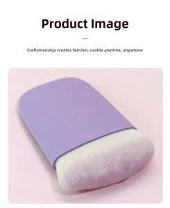 Close-up of soft purple flat head makeup brush with dense pink gradient fiber bristles