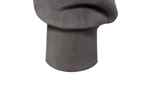Detail shot of men's thick jacket showing dark grey fleece fabric and ribbed knit cuffs