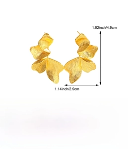 Macro shot of gold petal earrings with dimensions 4.9cm by 2.9cm and brushed texture