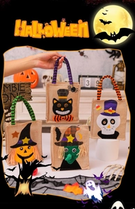 Detailed view of Halloween burlap gift bags with pumpkin and witch cartoon appliques