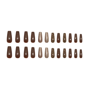 Caramel leopard print press-on nails with glitter accents in long ballet shape
