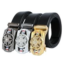 Rolled black belts featuring gold, silver, and gunmetal buckles with rhinestone stars