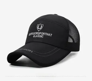 Detailed side view of breathable black mesh back panel and embroidered shield on trucker hat