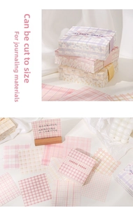 Close-up of pastel grid pattern memo pads for scrapbooking and DIY journaling decor