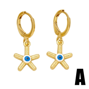 Golden starfish hoop earrings featuring a central blue evil eye design on white background