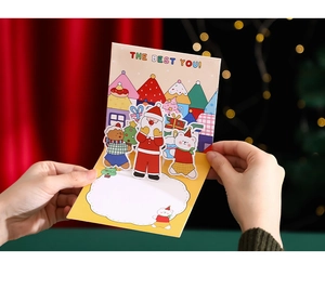 3D Pop-up Christmas card featuring Santa and gingerbread man with blank writing area