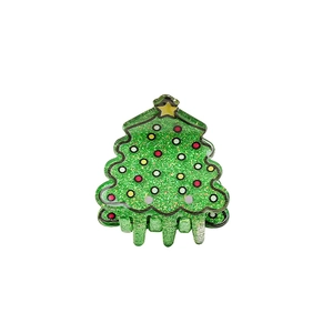 Green glitter Christmas tree hair claw clip with colorful dots and a yellow star top