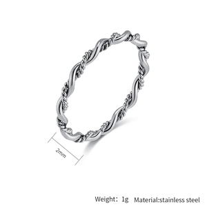 Detail view of 2mm silver braided stainless steel ring showing dimensions and weight