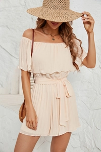 Detailed view of beige pleated chiffon off-shoulder romper with a matching waist belt