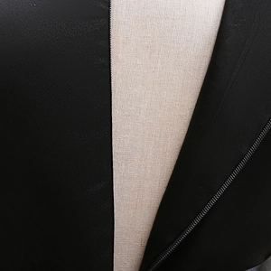 Close-up of invisible zipper and smooth fabric on black Halloween witch costume