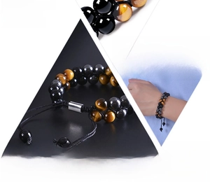 Detail of 8mm double-layer natural tiger eye and onyx beaded bracelet with adjustable cord