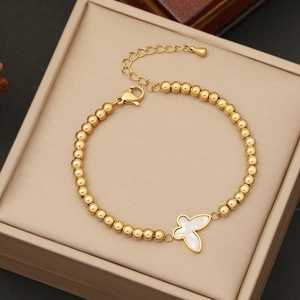 Elegant gold beaded stainless steel necklace with a white mother of pearl butterfly pendant