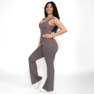 Detailed side view of deep grey backless sleeveless jumpsuit with flared leg fit