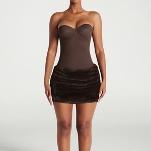 Detail of slim fit strapless dress with dark brown bodysuit and faux fur mini skirt