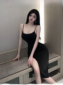 Close-up of black bodycon dress with spaghetti straps and high slit detail
