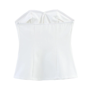 Detail of white strapless tube top featuring back zipper and non-slip silicone strip