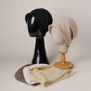 Breathable 100% linen knit beanies in black, beige, gray, white, and pale yellow