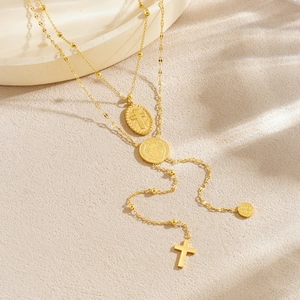Layered gold stainless steel necklace with religious cross and portrait coin pendants