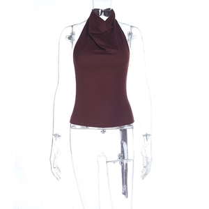 Detail of deep brown halter neck backless top with draped cowl neckline on a mannequin