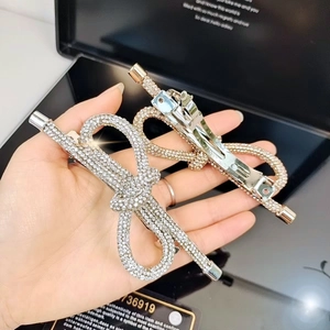 Fermagli per capelli a fiocco con strass brillanti in argento e oro rosa da donna