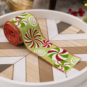 Detailansicht von Weihnachts-Juteband mit Bonbon-Wirbelmustern und goldenen Glitzerakzenten