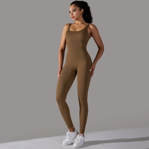 Detailed texture of seamless ribbed knit fabric on a brown athletic sleeveless bodysuit